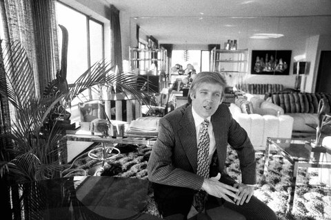 Donald J. Trump in the living room of his three-bedroom penthouse at 160 East 65th Street in 1976. © Paul Hosefros / The New York Times